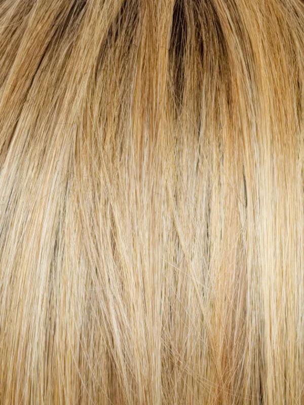 Cinder Toffee R | A mid blond shade with harmonious blend of beige, brown burnt toffee, blonde, and gold highlights woven throughout. A mid-brown root transitions into ends, creating a natural look. The multi-tonal highlights add depth and dimension.