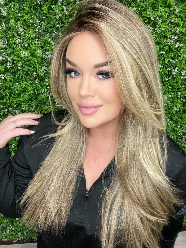 Long - length wig with a wavy texture for a beachy and romantic lookHenley Seduction Blonde HS Standard Luxury Wig CA1 W4729